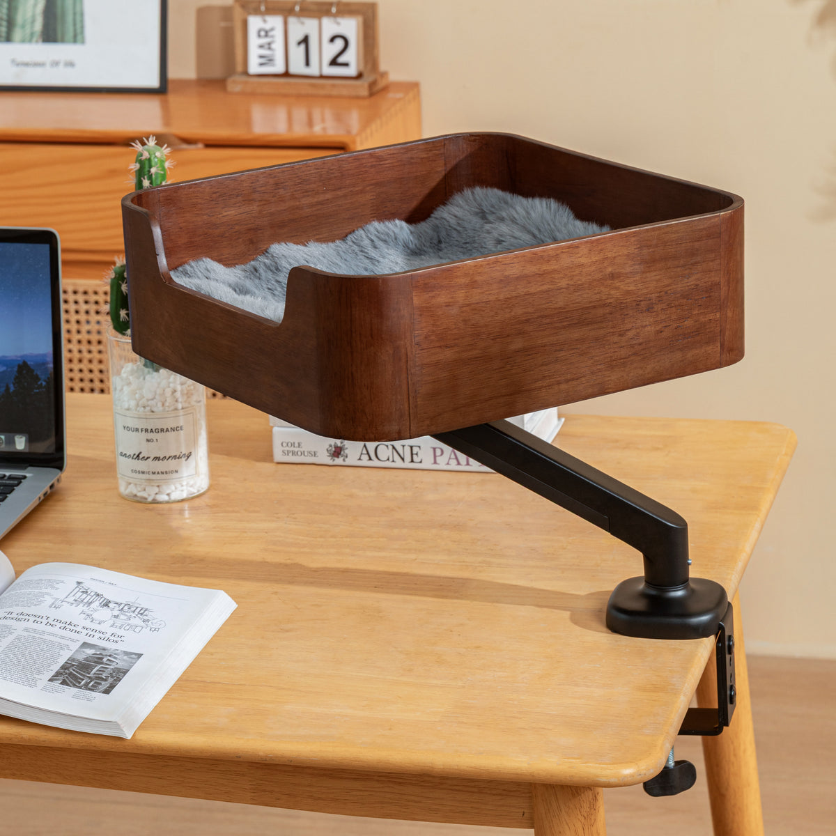 Catomi desk cat bed in Walnut with a grey faux fur cushion, mounted above a home office desk